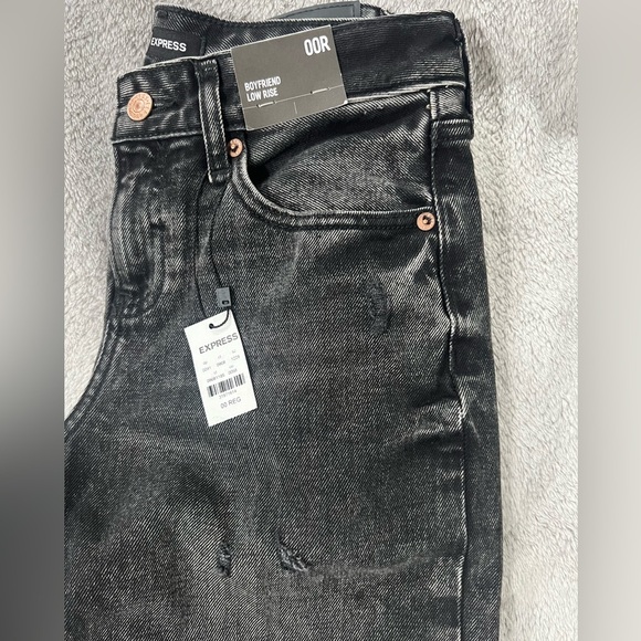 [Express] NWT Low Rise Black Ripped
Boyfriend Jeans - Picture 4 of 6